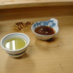 Japanese Restaurant in Kanda, Tokyo; Tempura Imoya dipping sauce(right bowl) and free tea(left tea cup)