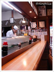 Sushi Restaurants in Tokyo | Kyowa; interior is long and divided by wooden counter