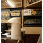Japanese Restaurants in Tokyo | Donmono no Sakai interior decorations and small window to kitchen
