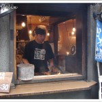 Japanese Restaurants in Tokyo | Unatoto food and service chef grilling eels in open window