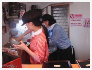 Japanese Restaurants in Tokyo Toto Don order and pay staf is preparing food ordered by ticket